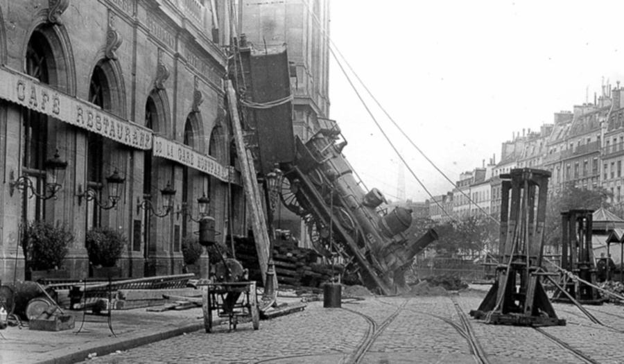 A steam locomotive after crashing through the wall of the second floor of Montparnasse station.